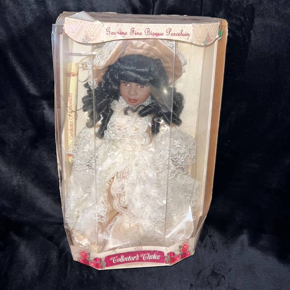 COLLECTOR’S CHOICE PORCELAIN DOLL